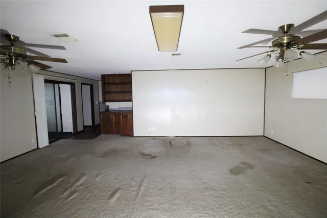 a view of a garage with a table and a window
