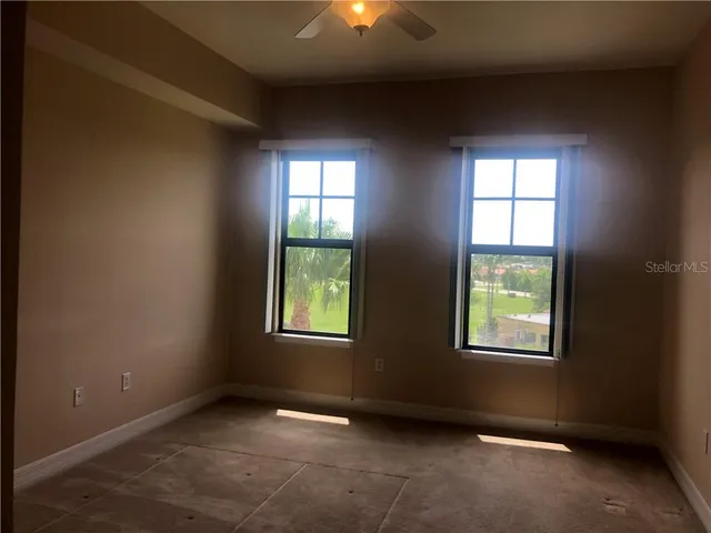 an empty room with windows