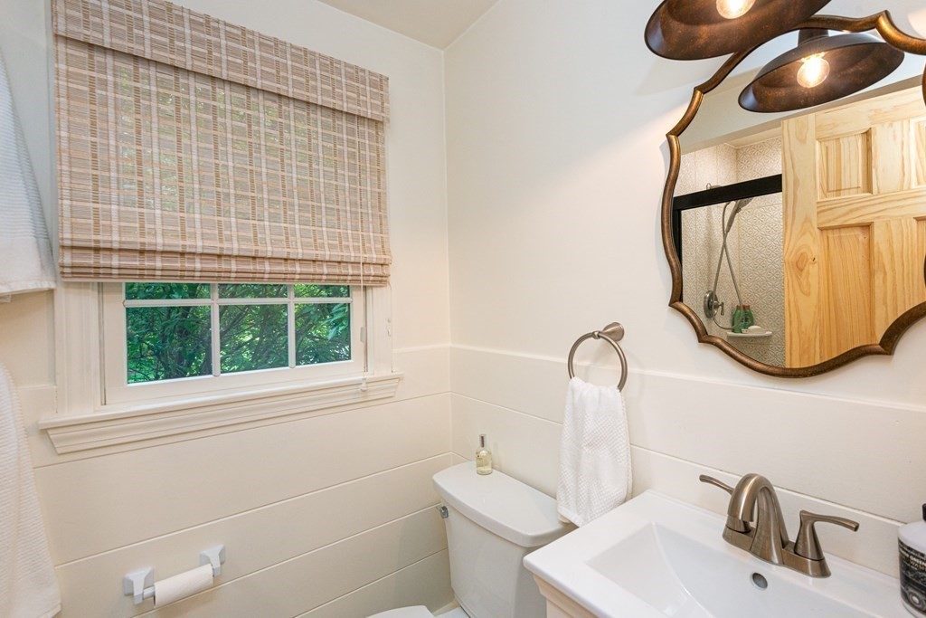 9 Parish Road Georgetown, MA 01833 - Photo 11 of 42 a bathroom with a sink and a mirror