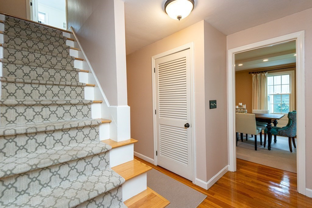 9 Parish Road Georgetown, MA 01833 - Photo 22 of 42 a view of a bedroom with wooden floor and windows