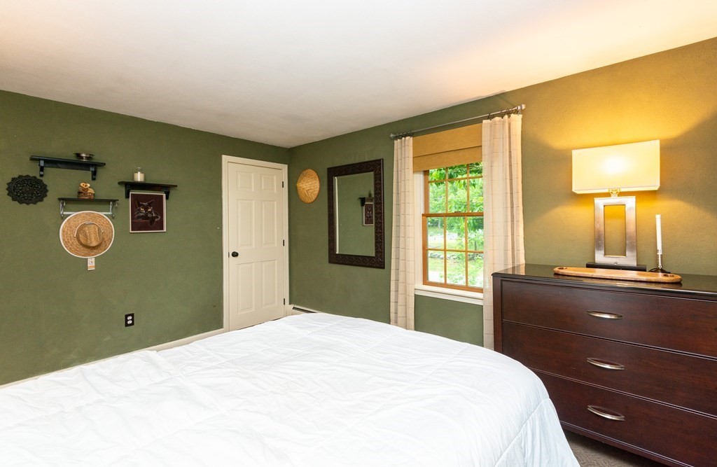 9 Parish Road Georgetown, MA 01833 - Photo 26 of 42 a bedroom with a bed and a window