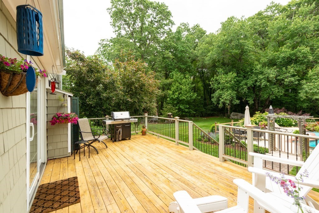 9 Parish Road Georgetown, MA 01833 - Photo 34 of 42 a view of a patio with swimming pool