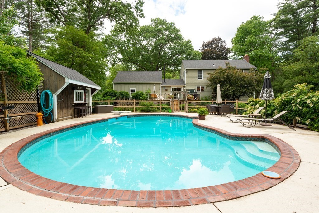 9 Parish Road Georgetown, MA 01833 - Photo 35 of 42 a view of a house with swimming pool and sitting area