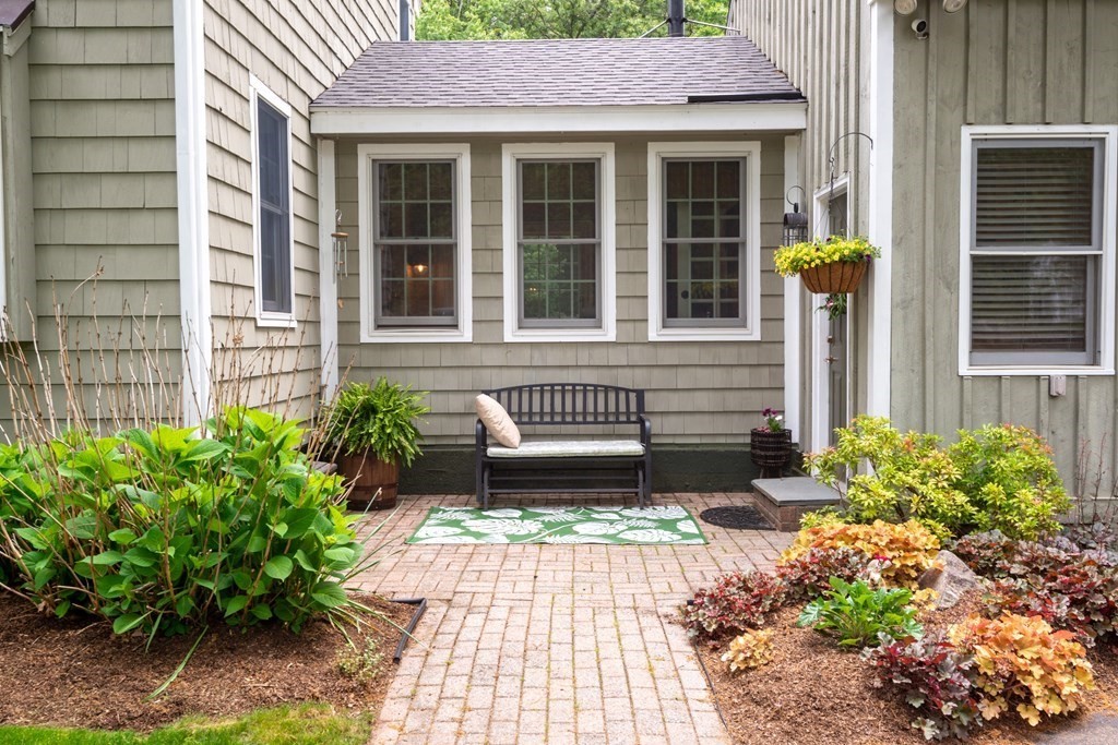 9 Parish Road Georgetown, MA 01833 - Photo 4 of 42 a front view of a house with garden