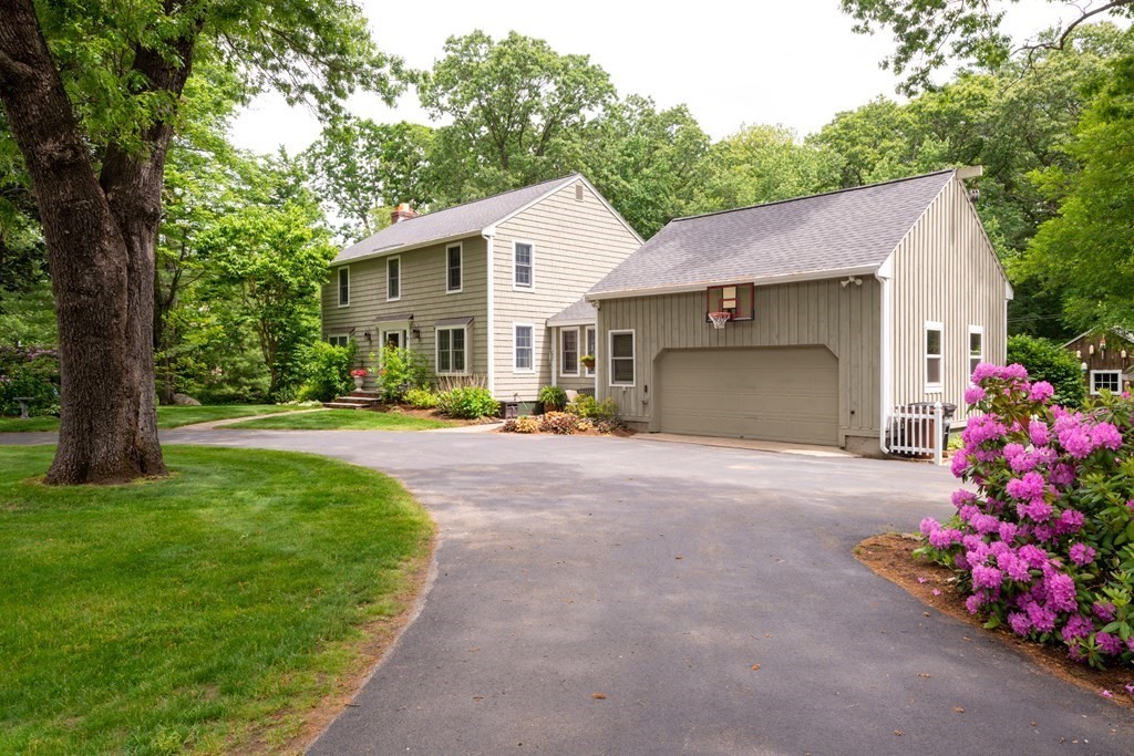 9 Parish Road Georgetown, MA 01833 - Photo 6 of 42 a front view of house with yard and trees around