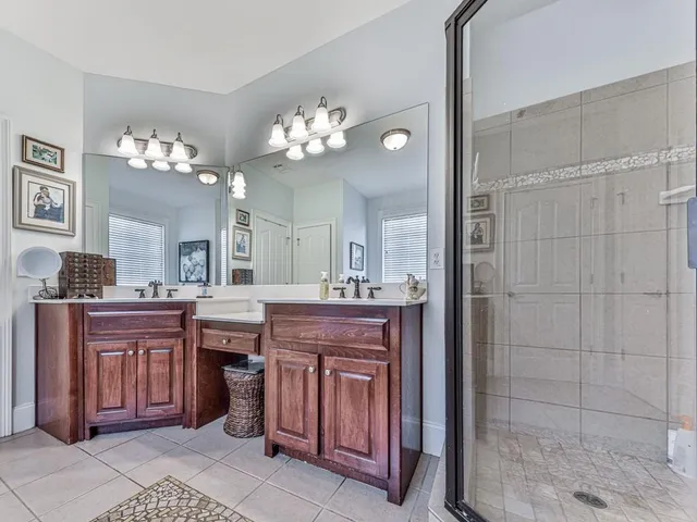 a kitchen with kitchen island cabinets and wooden floor