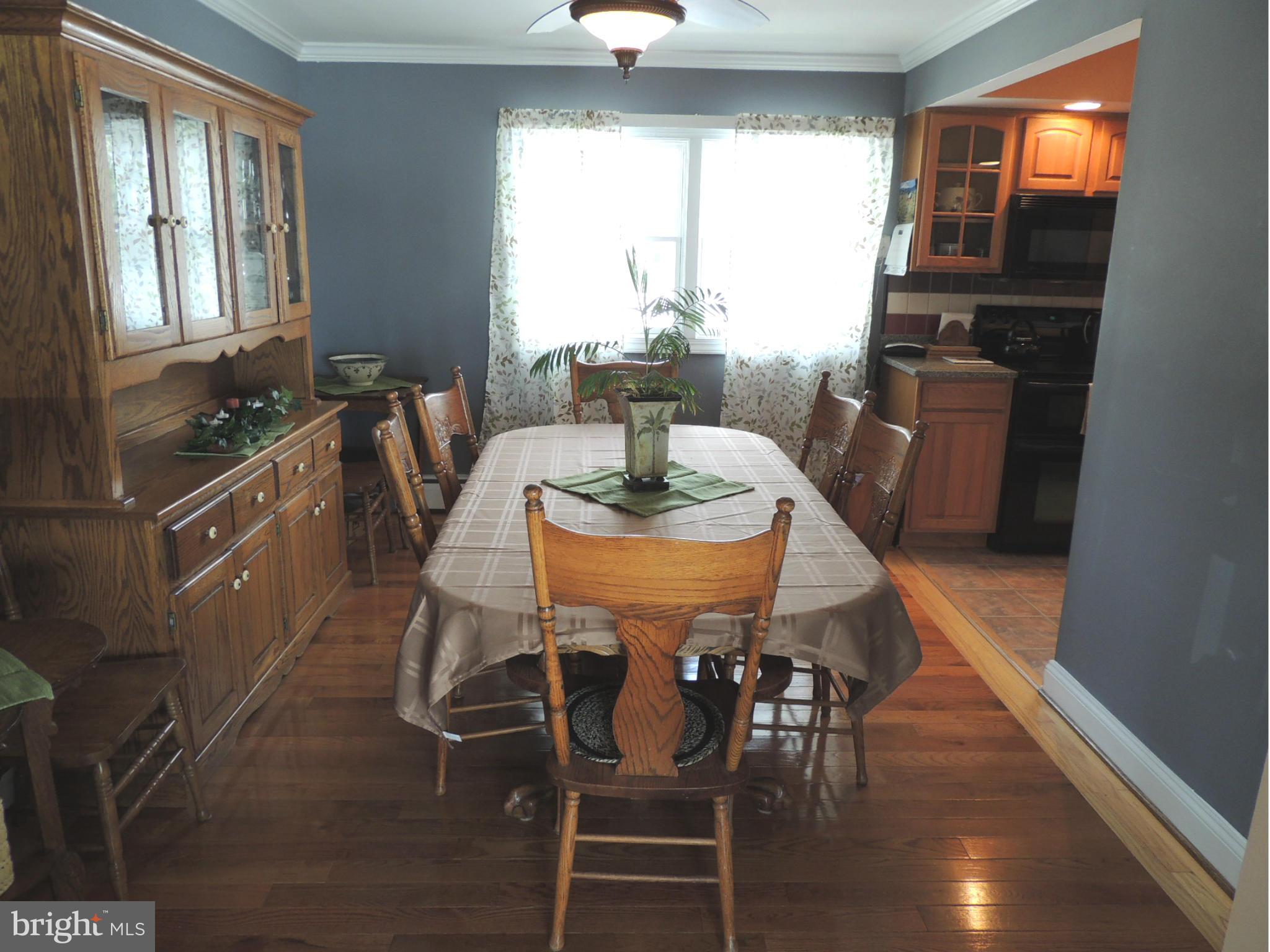 11823 Houck Road Union Bridge, MD 21791 - Photo 6 of 30 a dining room with furniture and wooden floor