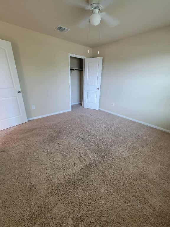 213 Camellia Drive Hutto, TX 78634 - Photo 18 of 27 a view of a livingroom with a ceiling fan