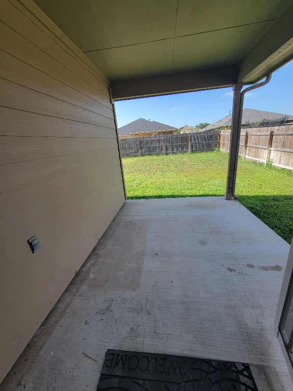 213 Camellia Drive Hutto, TX 78634 - Photo 24 of 27 a view of a big room with a big yard