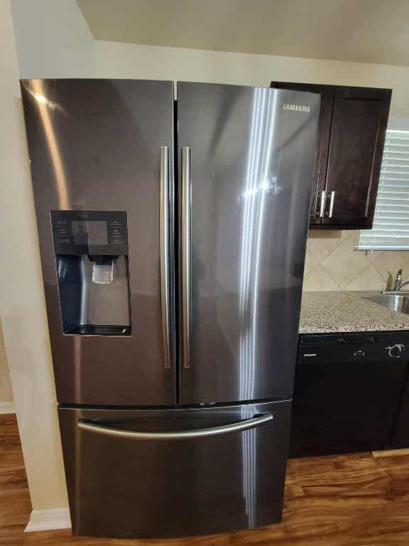 213 Camellia Drive Hutto, TX 78634 - Photo 10 of 27 a close view of water heater