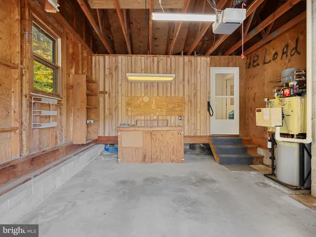 a view of an entryway with wooden walls