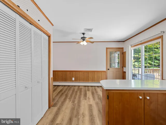a view of a living room with a large window