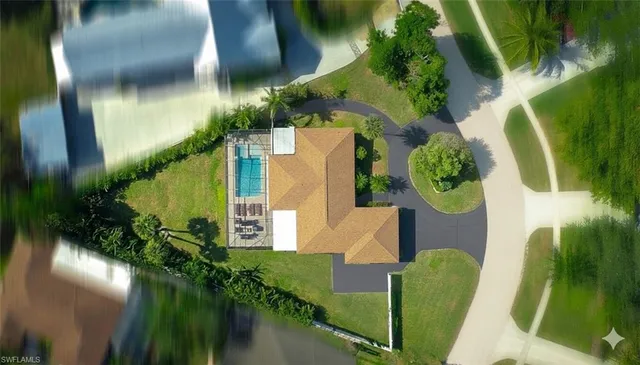 $949,000 | 102 Sharwood Drive, Naples, FL 34110