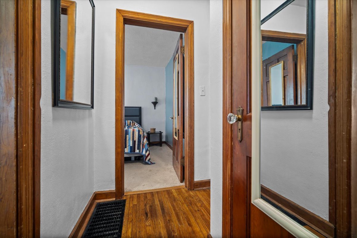 914 Normal Avenue Normal, IL 61761 - Photo 12 of 23 a view of a hallway with a livingroom and furniture