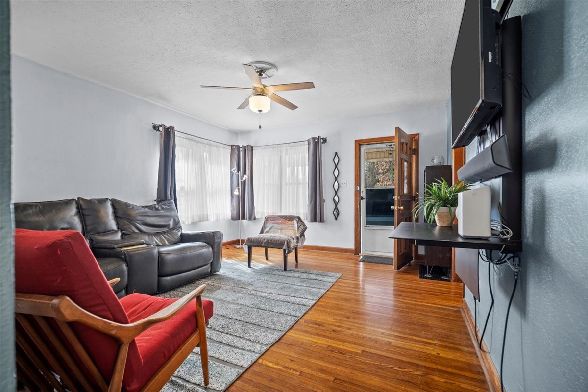 914 Normal Avenue Normal, IL 61761 - Photo 13 of 23 a living room with furniture or couch and a wooden floor
