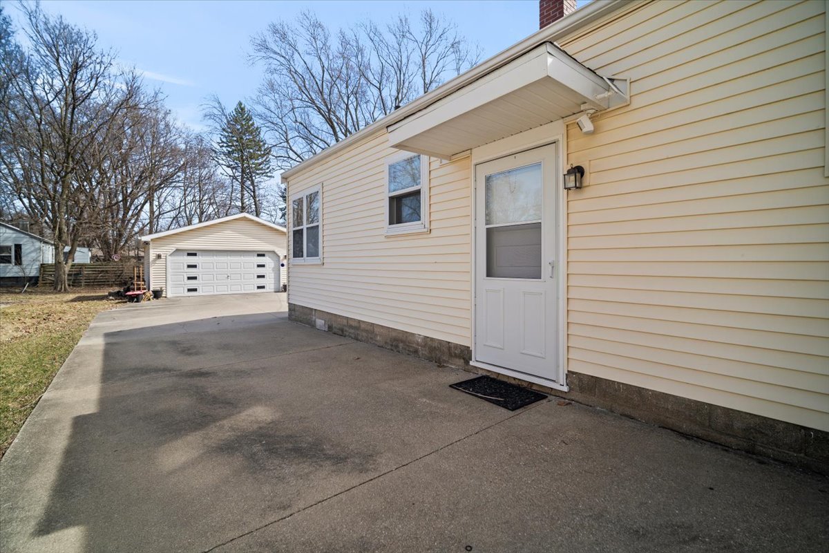 914 Normal Avenue Normal, IL 61761 - Photo 18 of 23 a view of a white house with a yard