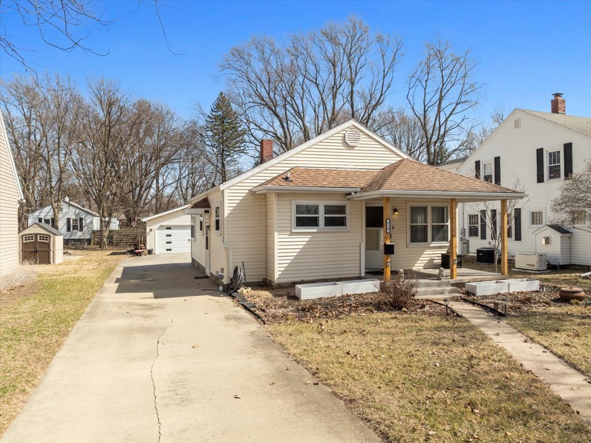 914 Normal Avenue Normal, IL 61761 - Photo 2 of 23 a front view of a house with garden