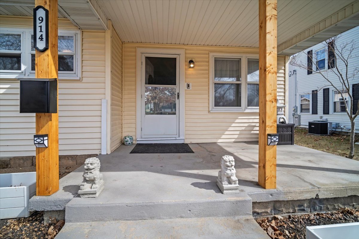 914 Normal Avenue Normal, IL 61761 - Photo 3 of 23 a front view of a house with street