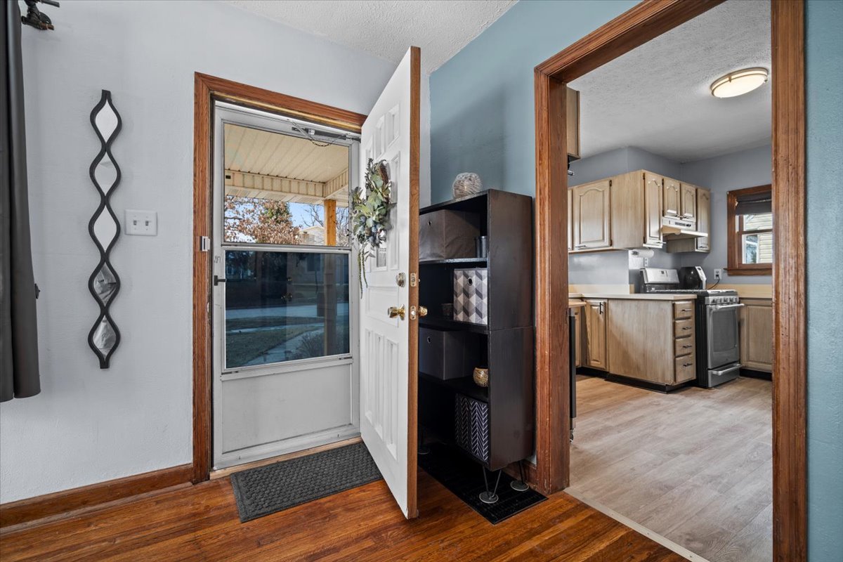 914 Normal Avenue Normal, IL 61761 - Photo 5 of 23 a view of a kitchen from the hallway