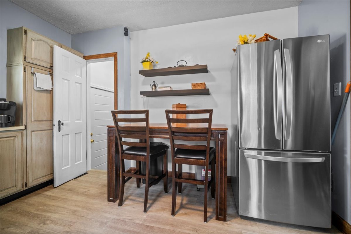 914 Normal Avenue Normal, IL 61761 - Photo 8 of 23 a kitchen with stainless steel appliances granite countertop a refrigerator and a stove top oven