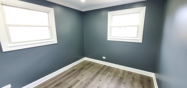 329 Fletcher Drive Wheeling, IL 60090 - Photo 12 of 16 a view of empty room with wooden floor