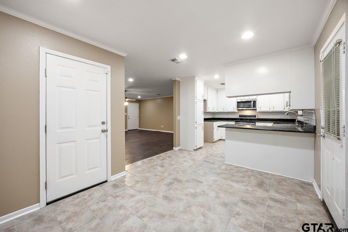 133 Caroline Street Rusk, TX 75785 - Photo 12 of 21 a view of kitchen with wooden floor