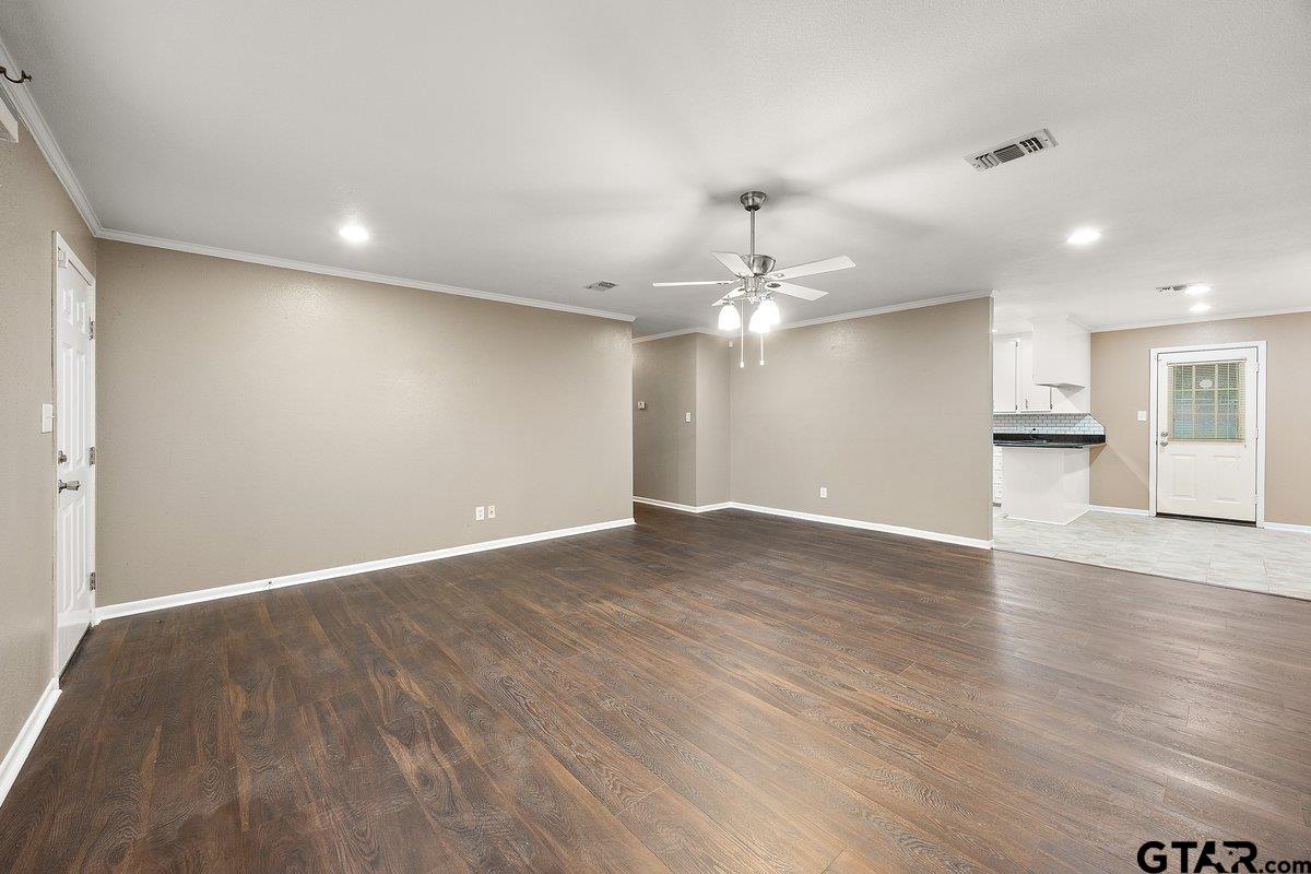 133 Caroline Street Rusk, TX 75785 - Photo 8 of 21 a view of empty room with wooden floor