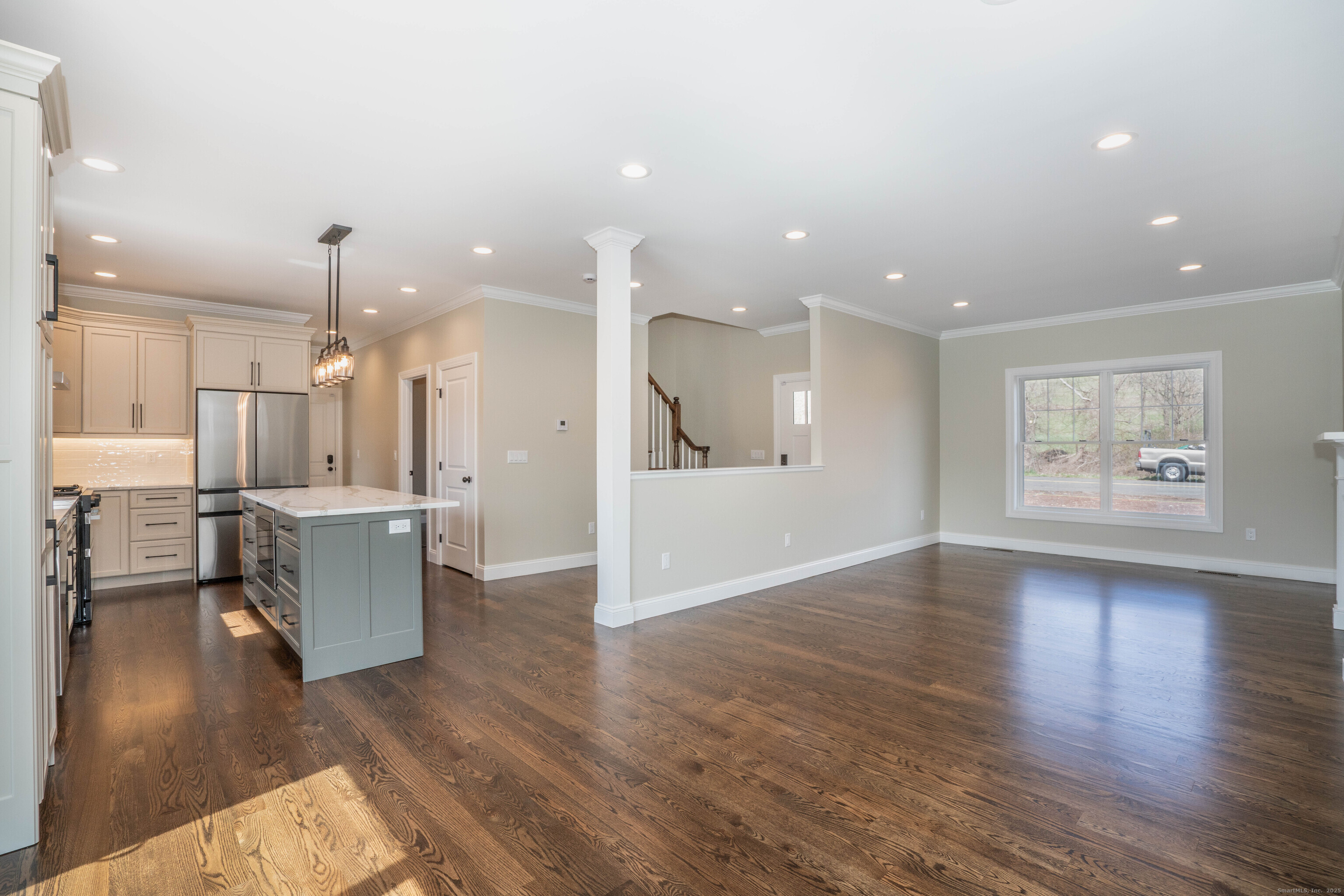 975 High Road Berlin, CT 06037 - Photo 21 of 35 a view of a living room and kitchen with hardwood floor