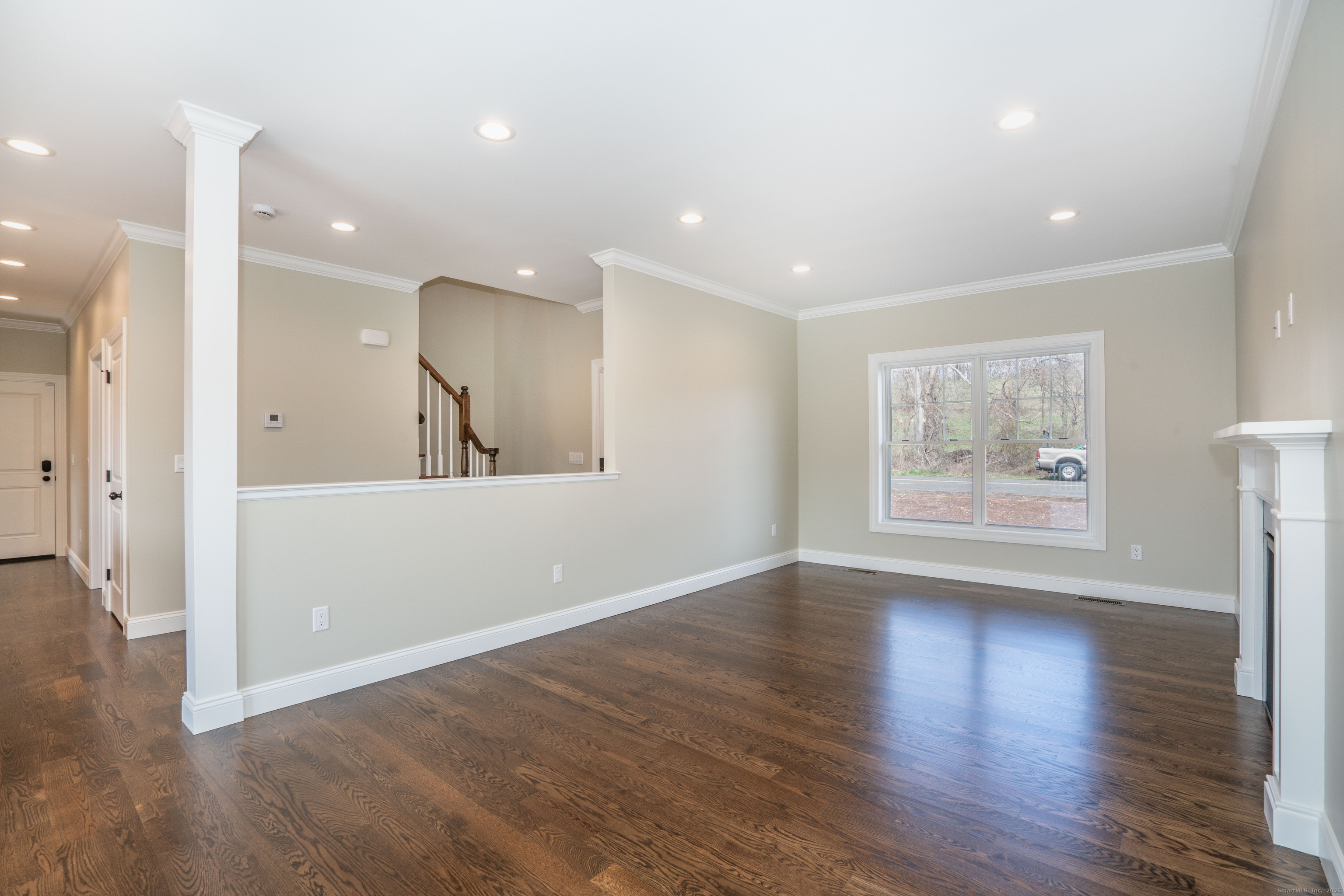 975 High Road Berlin, CT 06037 - Photo 21 of 34 a view of an empty room with wooden floor and a window