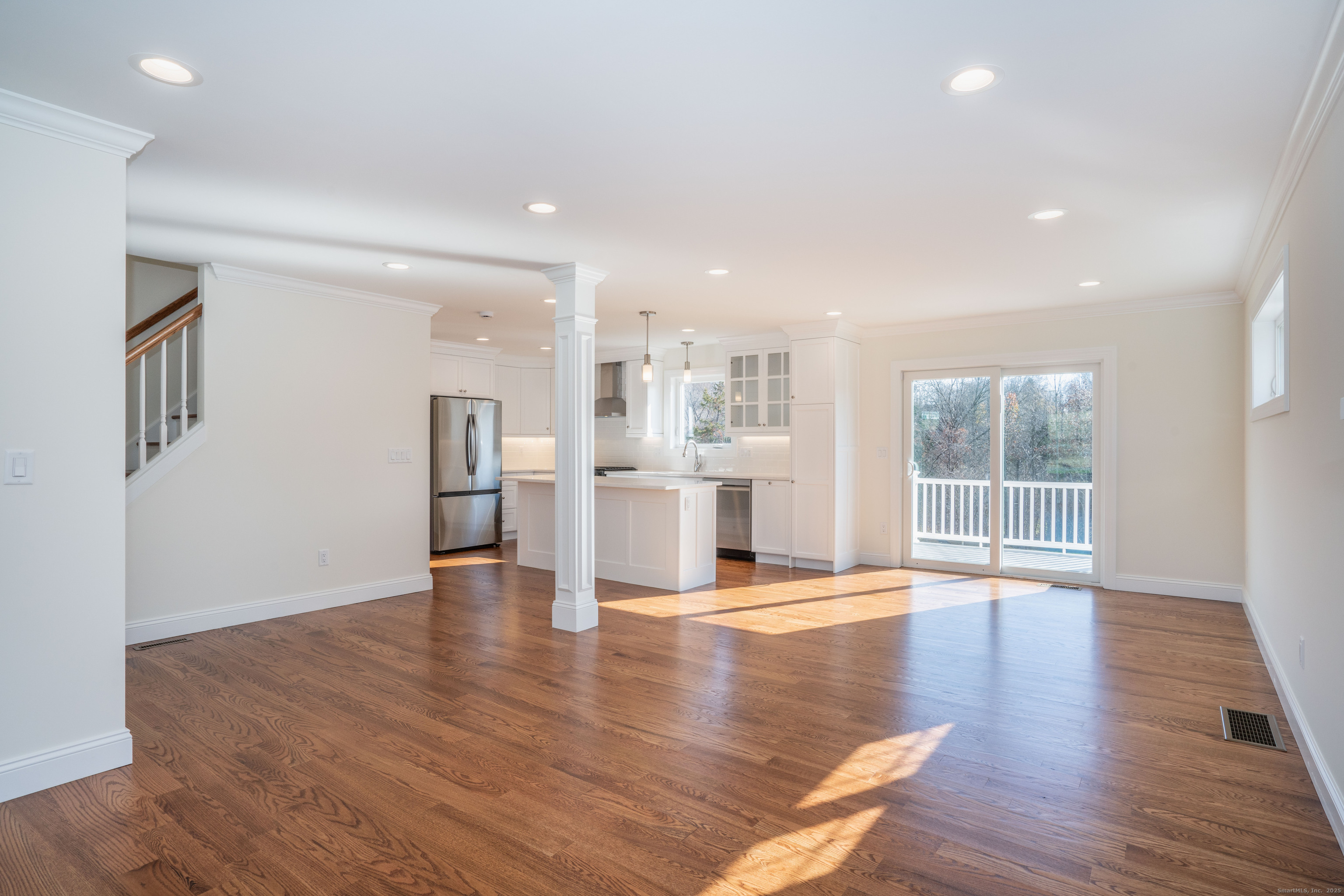 975 High Road Berlin, CT 06037 - Photo 23 of 35 a view of an empty room with wooden floor and a window
