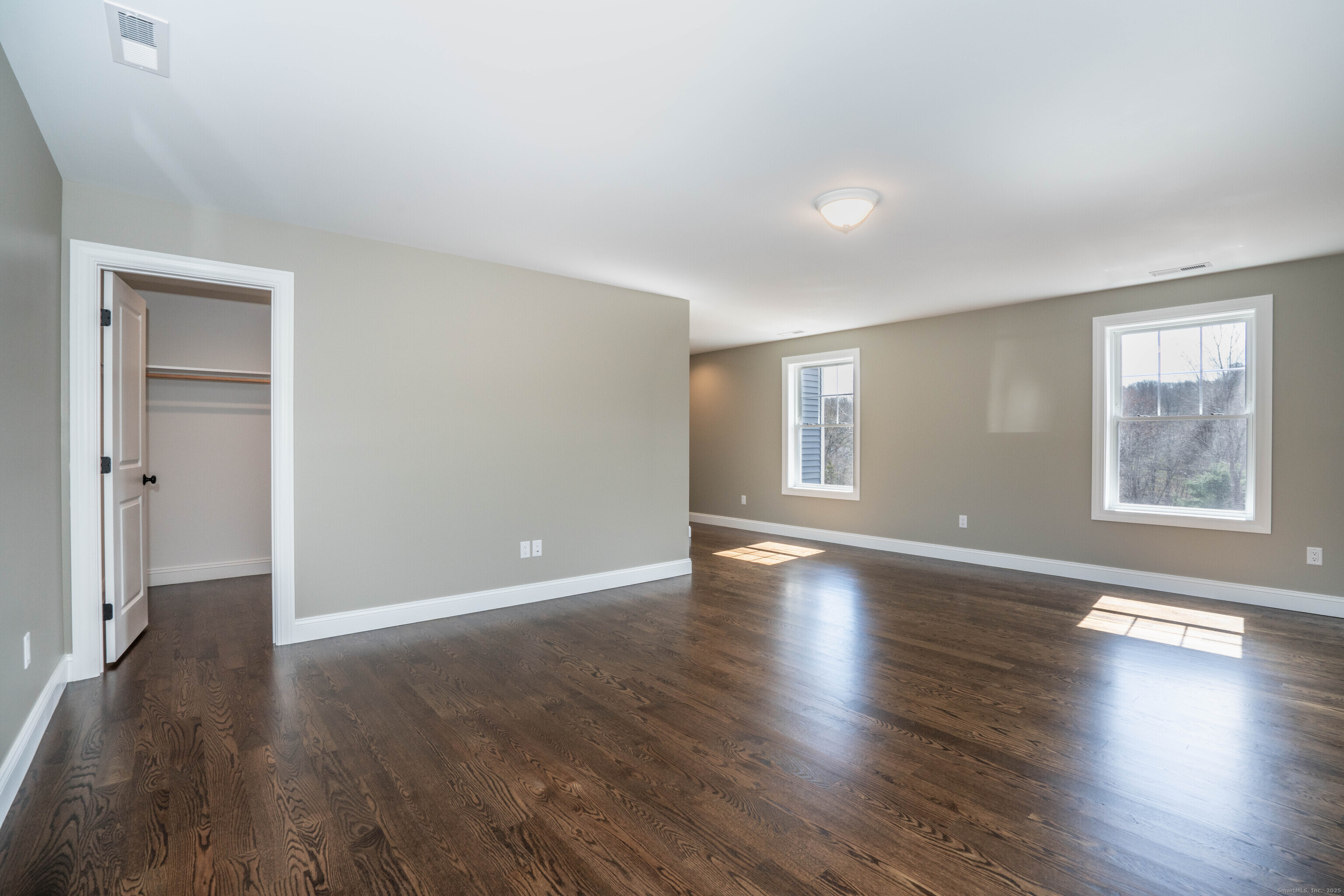 975 High Road Berlin, CT 06037 - Photo 27 of 34 an empty room with hard wood floors and window