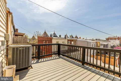 a view of city from a balcony