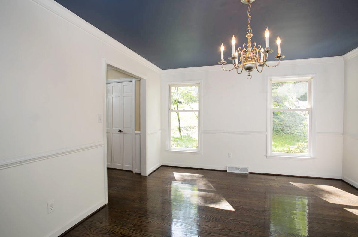 5135 Falcon Ridge Road Roanoke, VA 24018 - Photo 12 of 56 a view of a room with wooden floor chandelier and windows