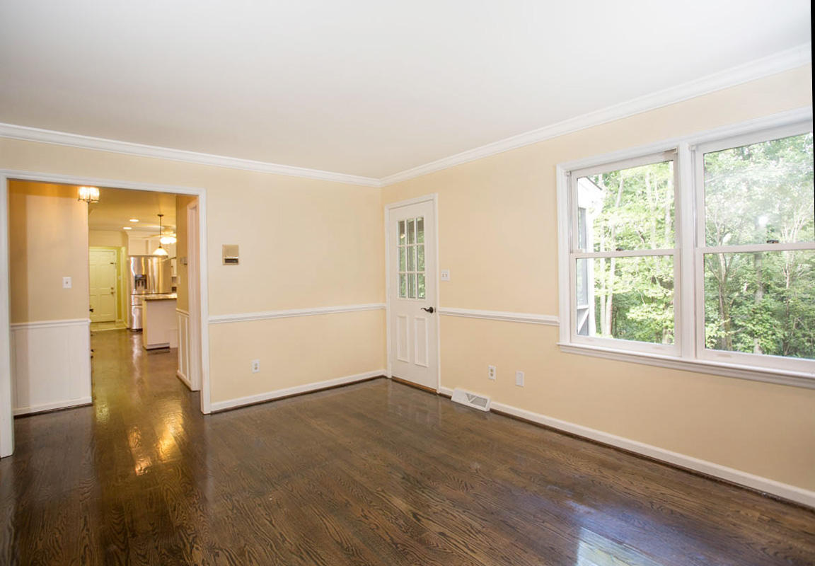 5135 Falcon Ridge Road Roanoke, VA 24018 - Photo 19 of 56 wooden floor in an empty room with a window