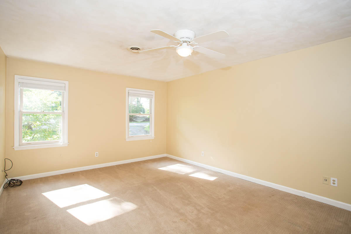 5135 Falcon Ridge Road Roanoke, VA 24018 - Photo 29 of 56 an empty room with windows and fan