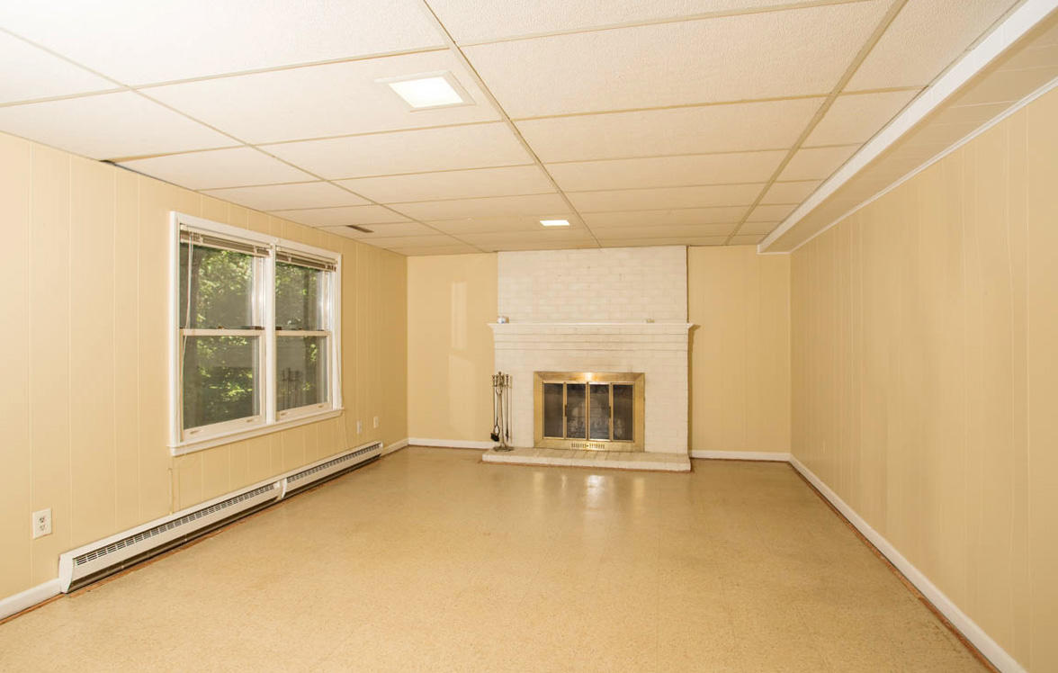 5135 Falcon Ridge Road Roanoke, VA 24018 - Photo 34 of 56 a view of empty room with a fireplace