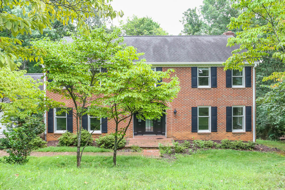 5135 Falcon Ridge Road Roanoke, VA 24018 - Photo 44 of 56 front view of a house with a yard