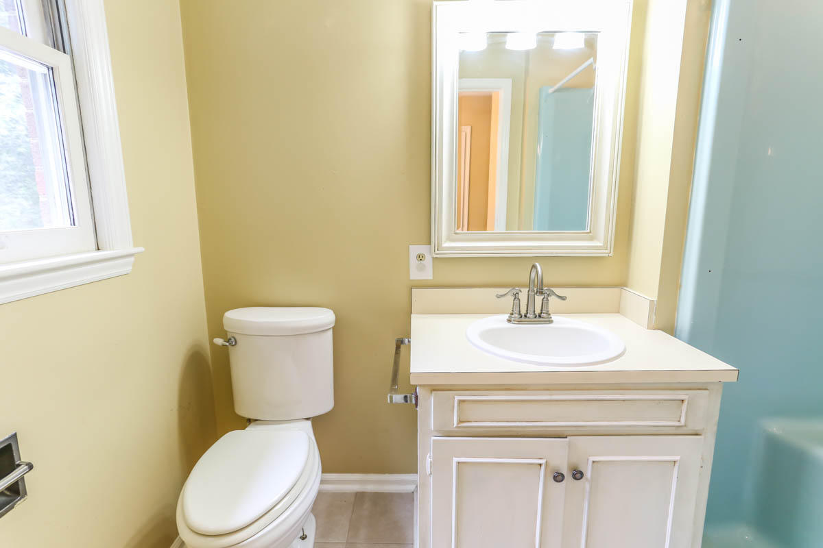 5135 Falcon Ridge Road Roanoke, VA 24018 - Photo 45 of 56 a bathroom with a sink mirror vanity and toilet