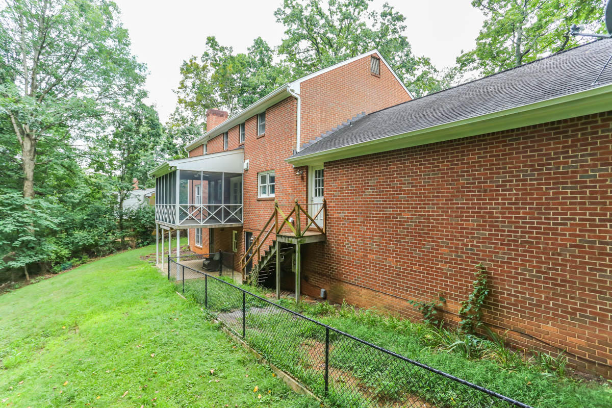 5135 Falcon Ridge Road Roanoke, VA 24018 - Photo 49 of 56 a view of a house with backyard and a patio
