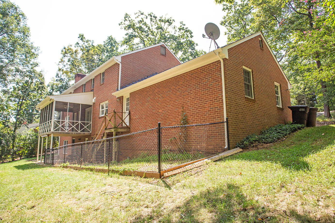5135 Falcon Ridge Road Roanoke, VA 24018 - Photo 55 of 56 a backyard of a house with wooden fence