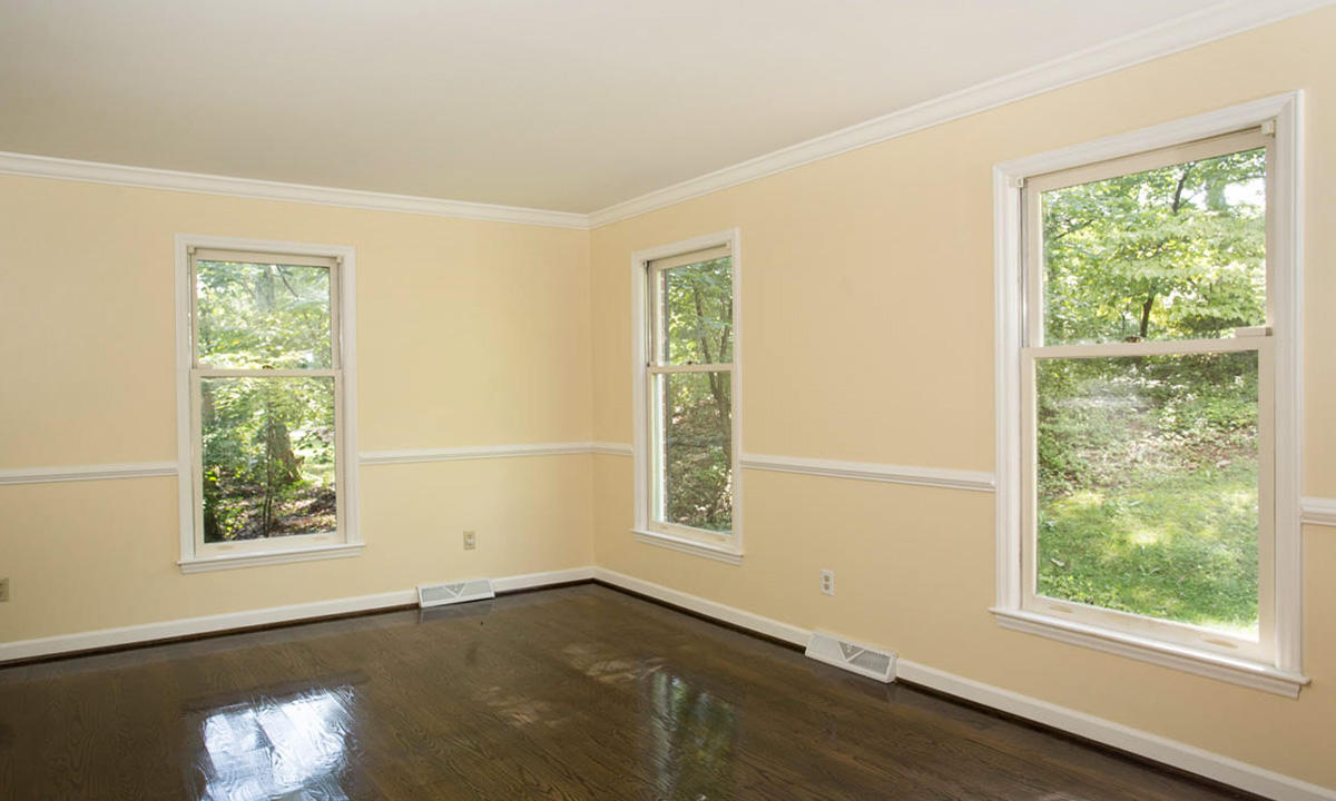 5135 Falcon Ridge Road Roanoke, VA 24018 - Photo 8 of 56 an empty room with wooden floor and windows