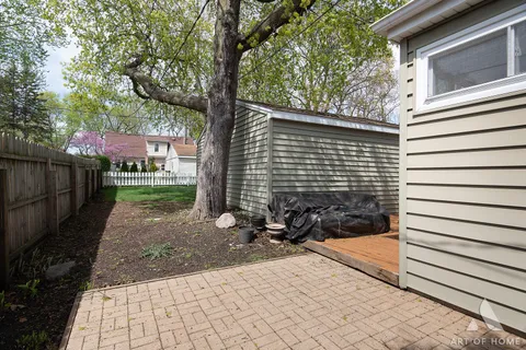 a view of a back yard of the house