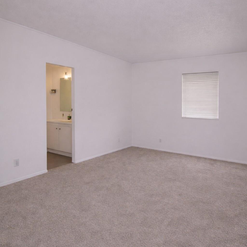 33831 Medford Road Auberry, CA 93602 - Photo 15 of 35 an empty room with windows and bathroom