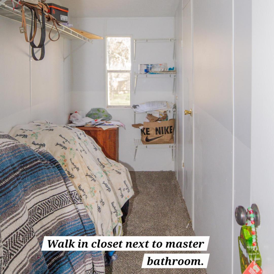 33831 Medford Road Auberry, CA 93602 - Photo 24 of 28 a bedroom with a bed and a window