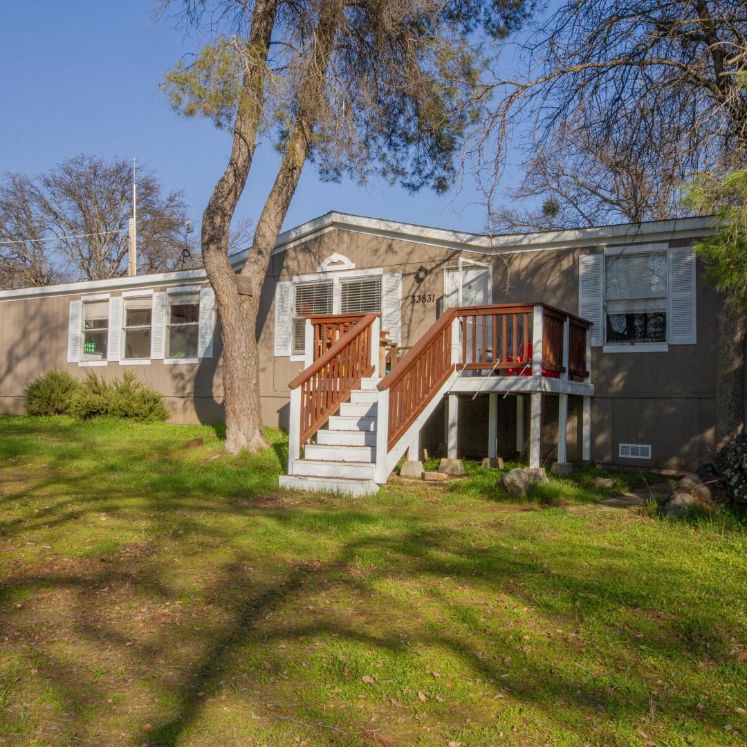 33831 Medford Road Auberry, CA 93602 - Photo 10 of 28 a view of a house with a big yard