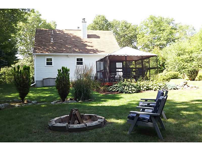 150 Ridge Road Smithfield, RI 02917 - Photo 17 of 21 Exterior Back. Fire Pit
