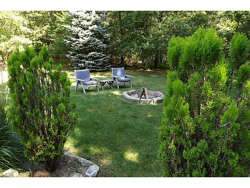 150 Ridge Road Smithfield, RI 02917 - Photo 18 of 21 Exterior Back. Fire Pit