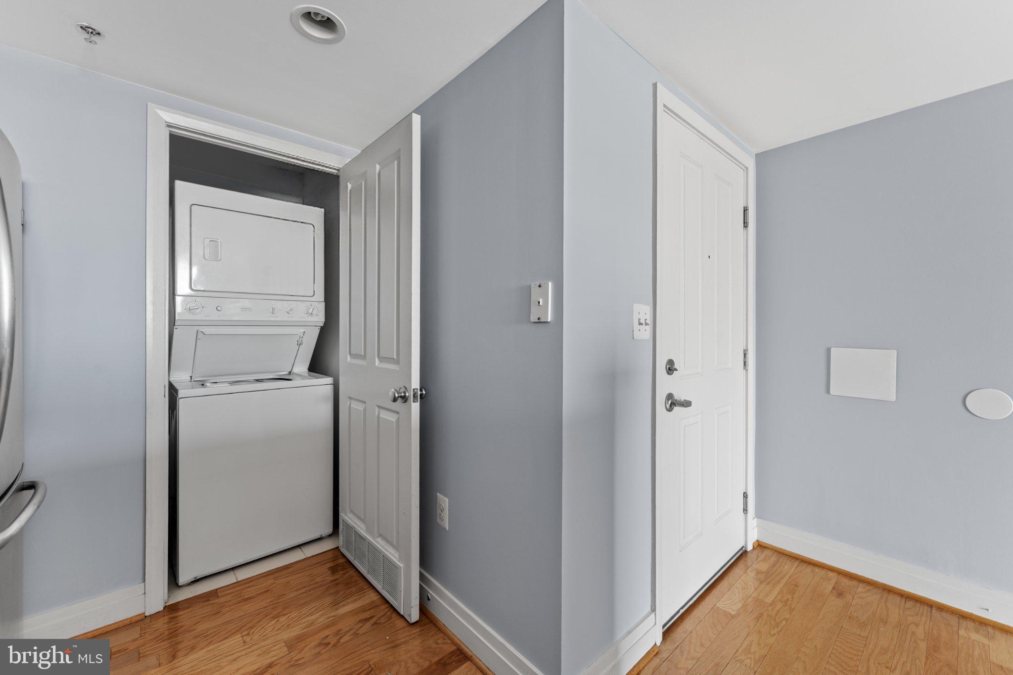 414 Water Street, Unit 1306 Baltimore, MD 21202 - Photo 22 of 29 Efficient laundry nook with modern design.