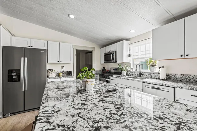 a utility room with washer and dryer