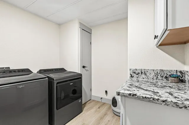 a view of a hardwood & utility room